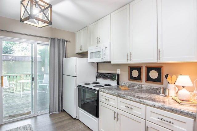 kitchen featuring light hardwood / wood-style floors, white cabinetry, light stone counters, and white appliances