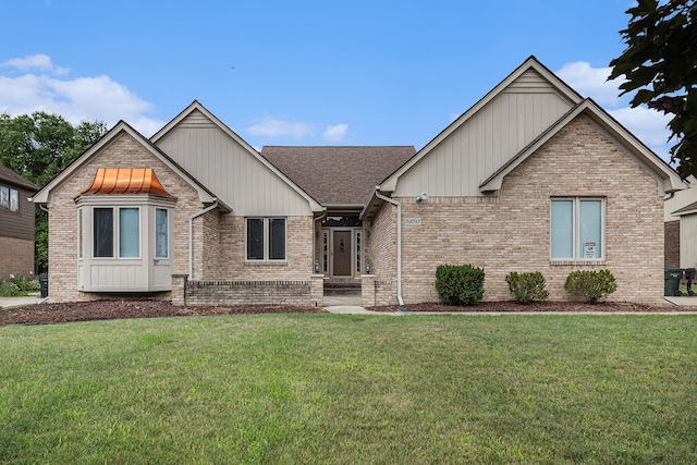 view of front of home with a front yard