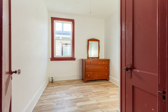 bedroom with light hardwood / wood-style flooring