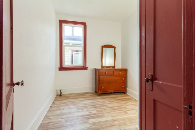 11434 Mcdougall St, Hamtramck, MI 48212 - bedroom with light wood-style flooring and baseboards