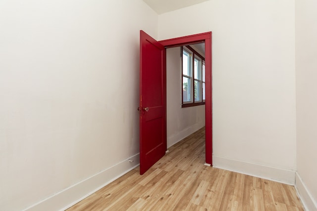 spare room featuring light wood-type flooring