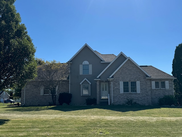 view of front property with a front lawn