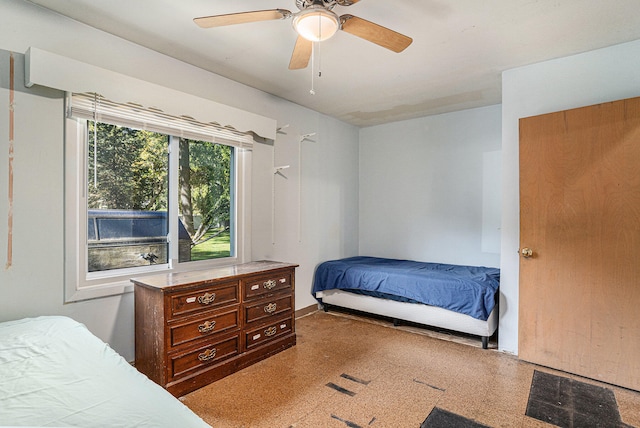 bedroom featuring ceiling fan