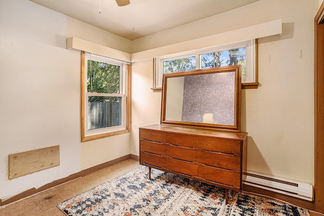 living area featuring ceiling fan