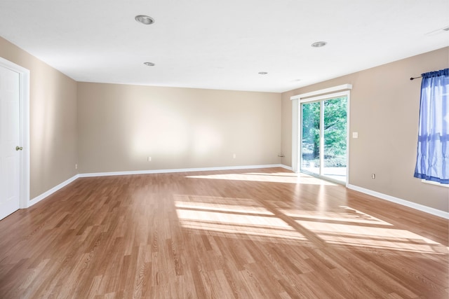 empty room with light wood-type flooring