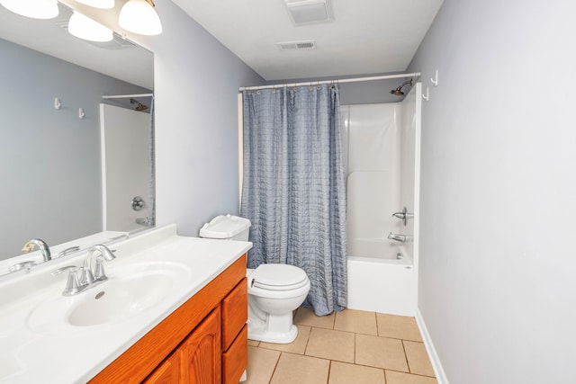 full bathroom with tile patterned flooring, vanity, toilet, and shower / bath combo with shower curtain