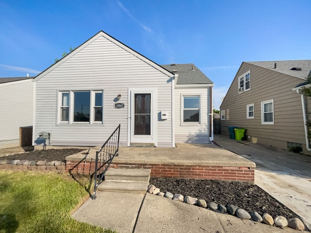 back of property with a patio area