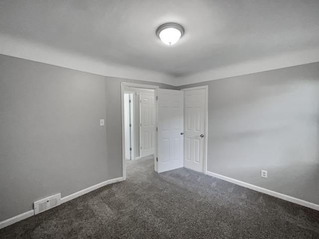 unfurnished bedroom with carpet