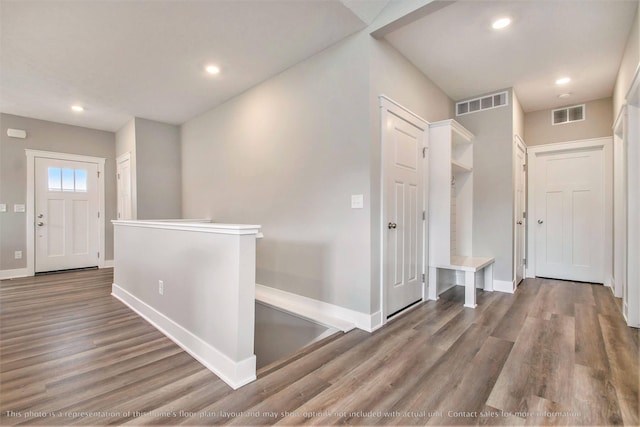 hallway featuring wood-type flooring