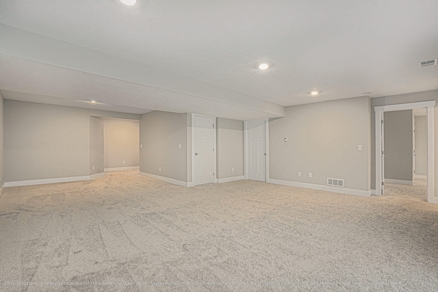 basement with light carpet