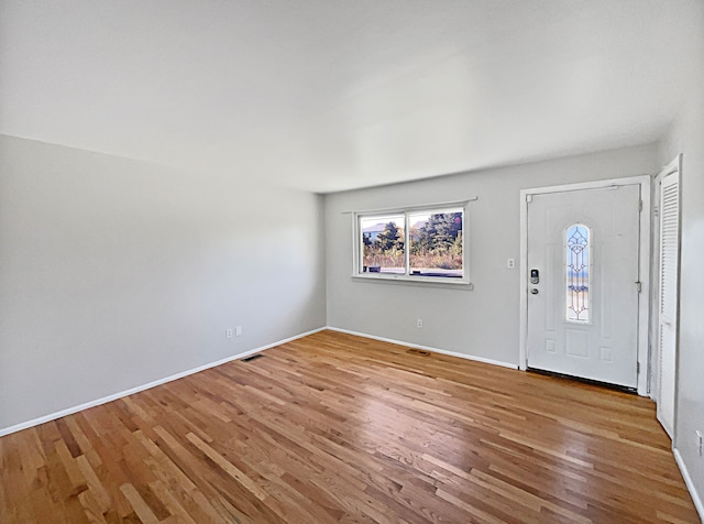 entryway with light hardwood / wood-style floors