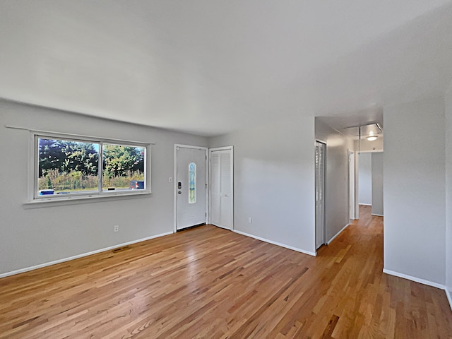 entryway with light wood-type flooring