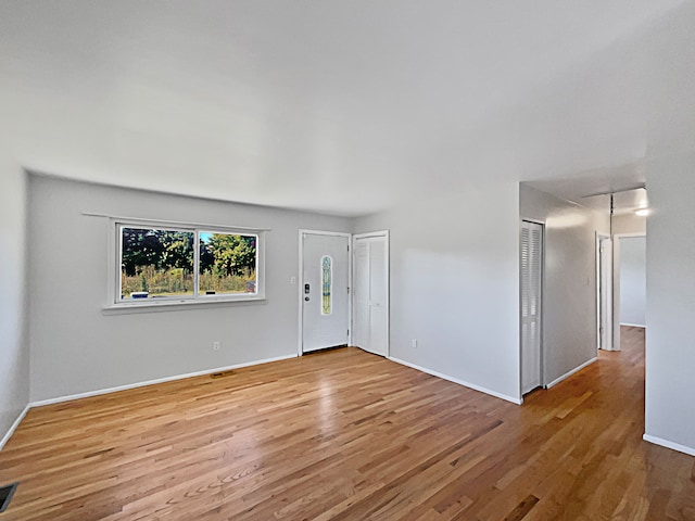 entrance foyer featuring light hardwood / wood-style floors