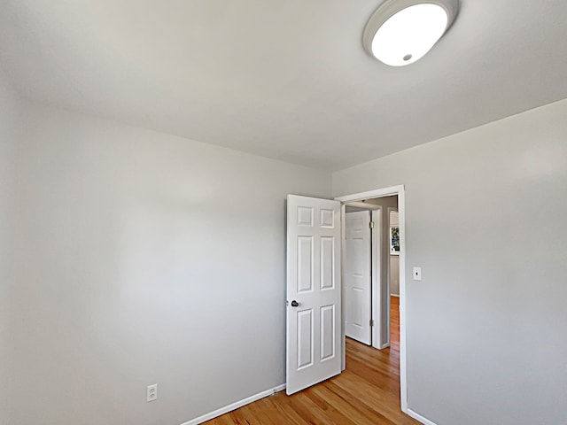 empty room with light wood-type flooring