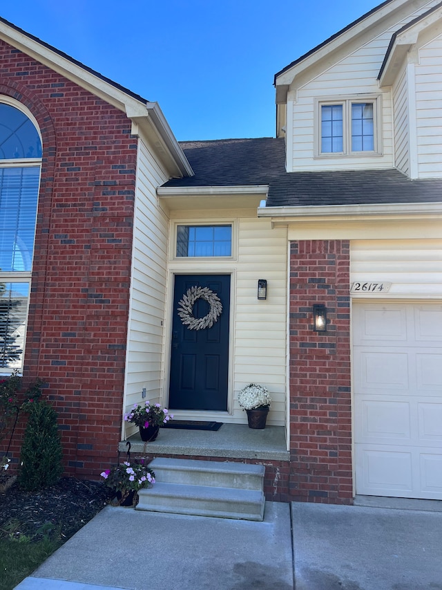 entrance to property with a garage