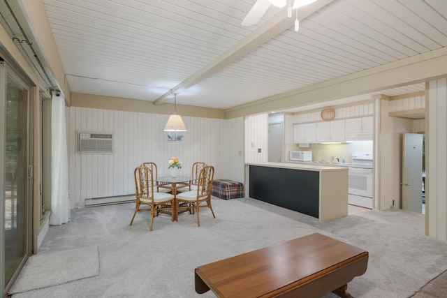 carpeted dining room featuring beam ceiling, a baseboard radiator, and a wall mounted AC