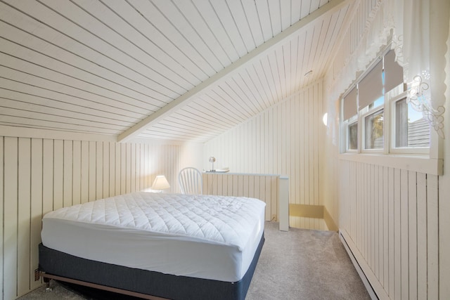 carpeted bedroom featuring a baseboard heating unit, lofted ceiling with beams, radiator heating unit, wooden walls, and wood ceiling