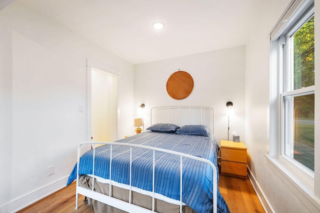 bedroom featuring hardwood / wood-style flooring