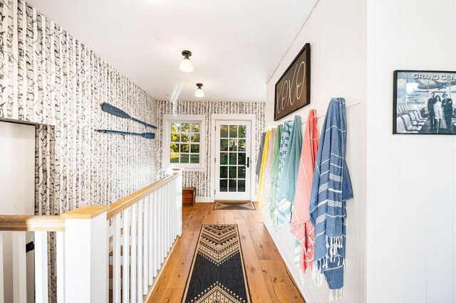 9695 Community Hall Rd, Union Pier, MI 49129 - corridor with light wood-style floors and wallpapered walls