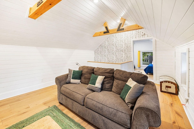 living room featuring wood-type flooring, lofted ceiling with beams, and wood ceiling