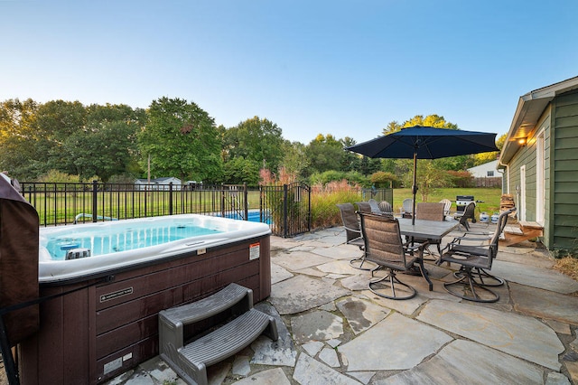 view of patio / terrace featuring a hot tub