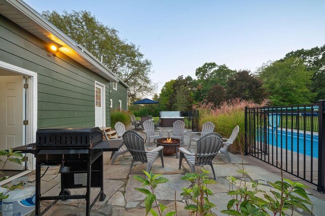 9695 Community Hall Rd, Union Pier, MI 49129 - view of patio / terrace with an outdoor fire pit and grilling area