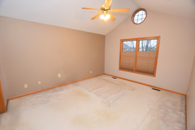 unfurnished room featuring ceiling fan, lofted ceiling, and carpet