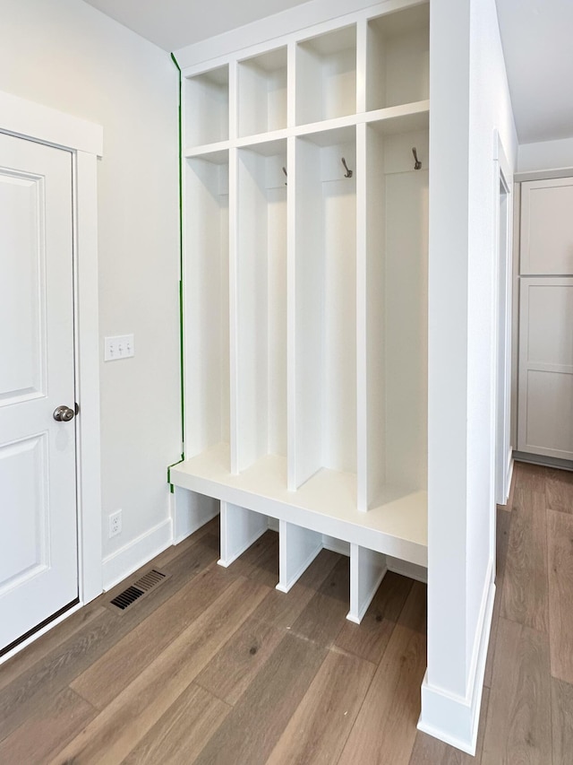 mudroom with hardwood / wood-style flooring