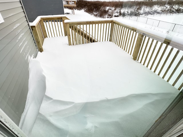 view of snow covered deck