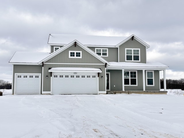 view of front facade featuring a garage and a porch