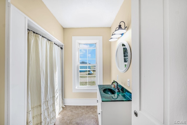 bathroom featuring vanity and tile patterned floors