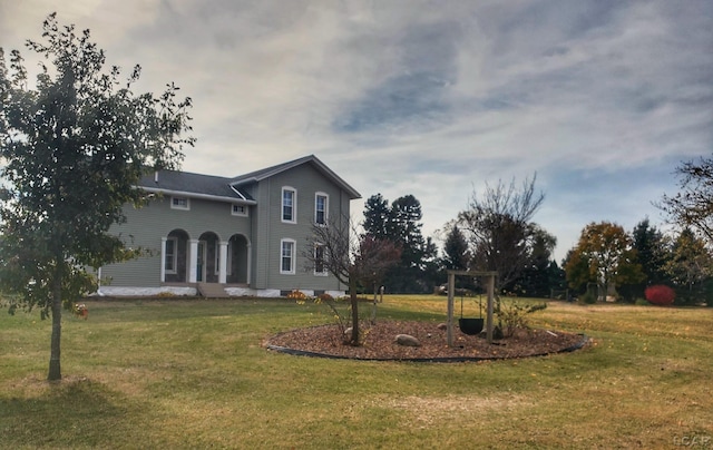 view of home's exterior featuring a lawn