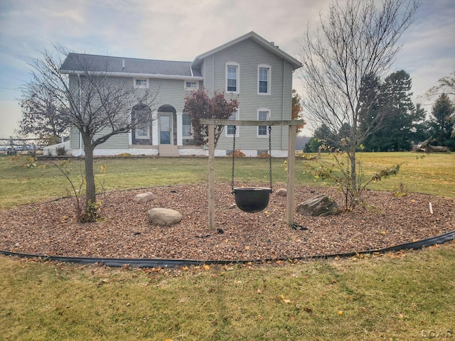 view of front facade with a front lawn