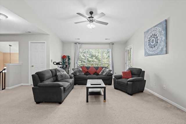 living room featuring ceiling fan