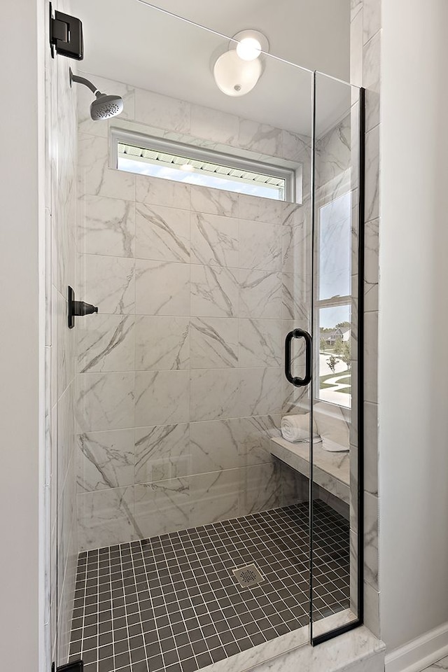 bathroom featuring walk in shower