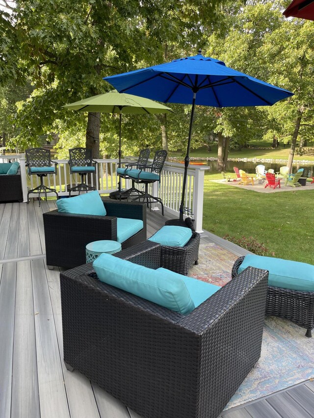 23739 Grandview Ct, Sturgis, MI 49091 - deck featuring a lawn and an outdoor hangout area