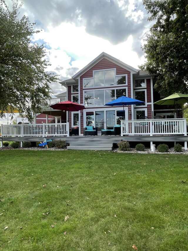 23739 Grandview Ct, Sturgis, MI 49091 - rear view of house with a deck and a lawn