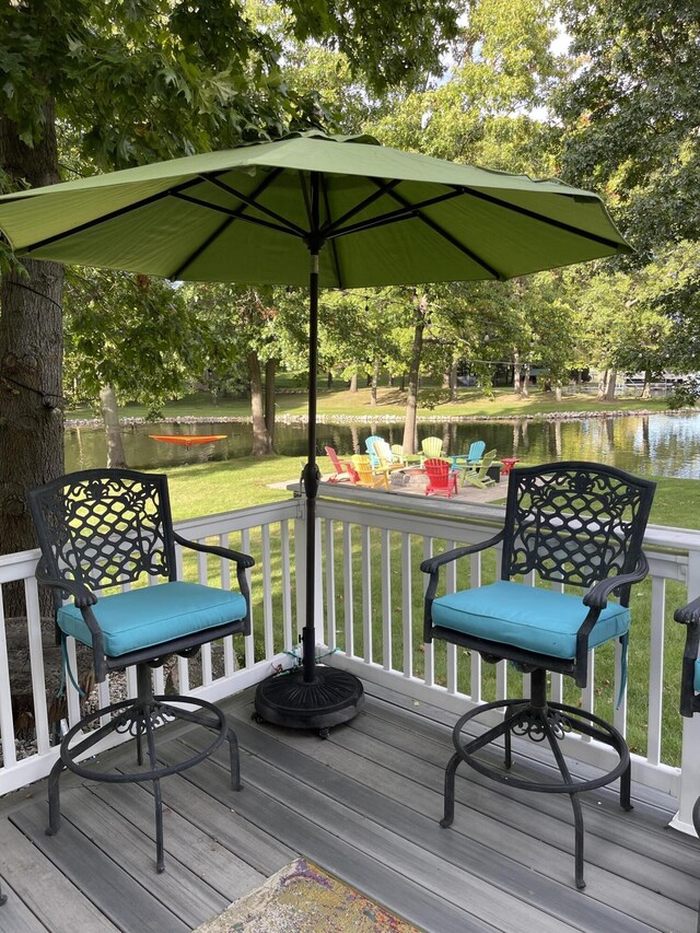 23739 Grandview Ct, Sturgis, MI 49091 - wooden terrace featuring a water view and a lawn