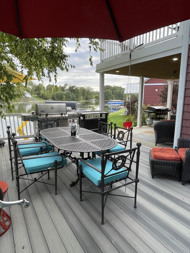 23739 Grandview Ct, Sturgis, MI 49091 - deck featuring outdoor dining area and a water view