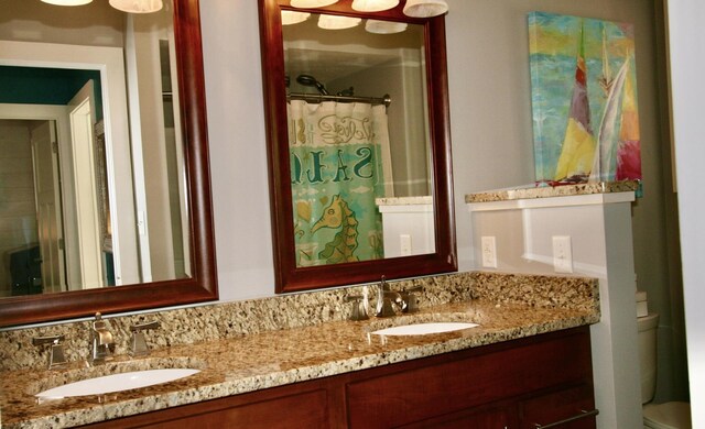 23739 Grandview Ct, Sturgis, MI 49091 - full bath featuring double vanity and toilet
