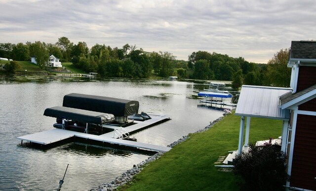 23739 Grandview Ct, Sturgis, MI 49091 - dock area featuring a water view and a lawn