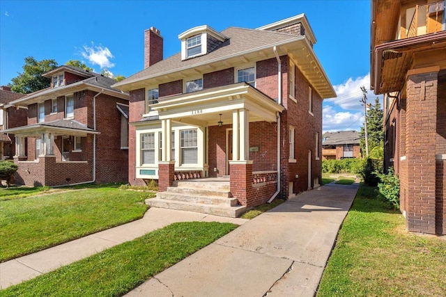 view of front facade featuring a porch and a front yard