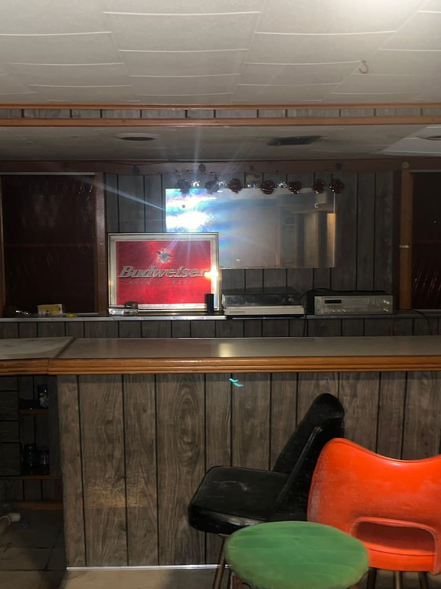15782 Ohio St, Detroit, MI 48238 - bar with tile patterned floors and a bar