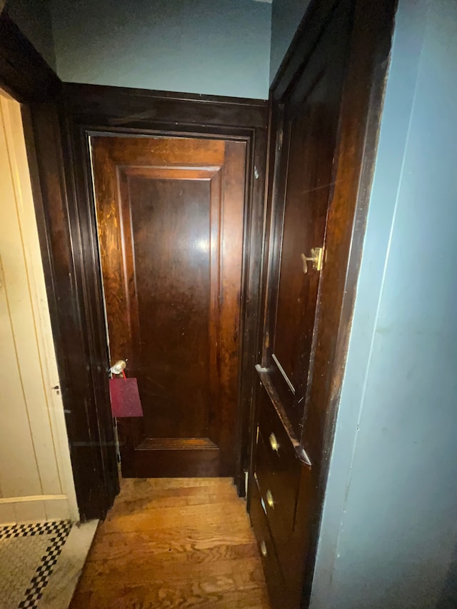 15782 Ohio St, Detroit, MI 48238 - hallway with wood walls and wood finished floors