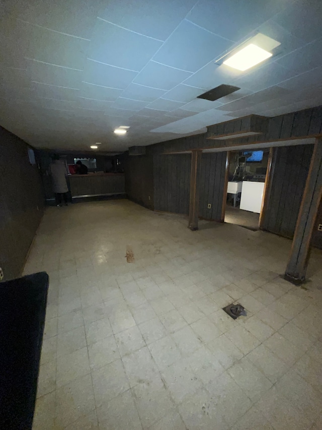 15782 Ohio St, Detroit, MI 48238 - finished basement with tile patterned floors, a paneled ceiling, and a sink