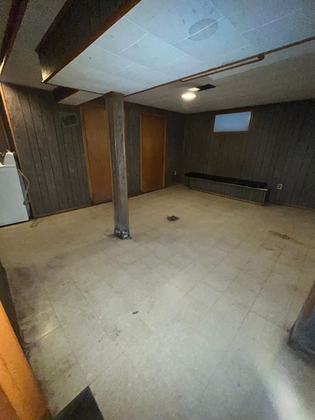 basement with wood walls