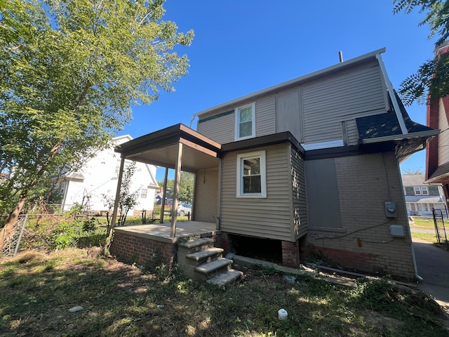 back of house with a porch