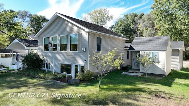 view of home's exterior with a lawn