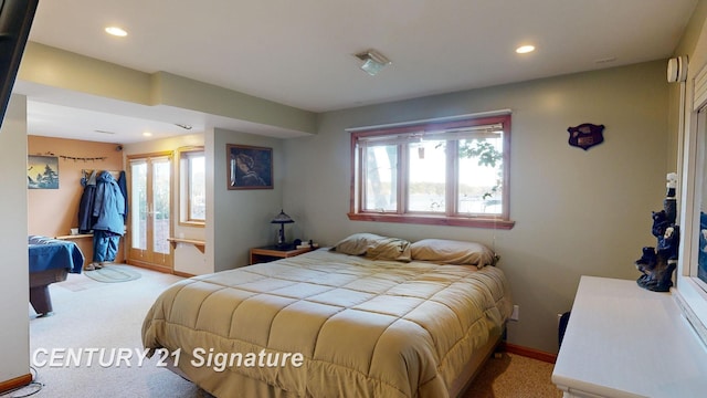 bedroom with recessed lighting, baseboards, and carpet floors