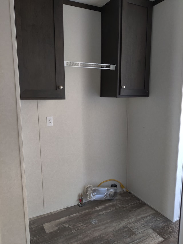 washroom with dark hardwood / wood-style floors